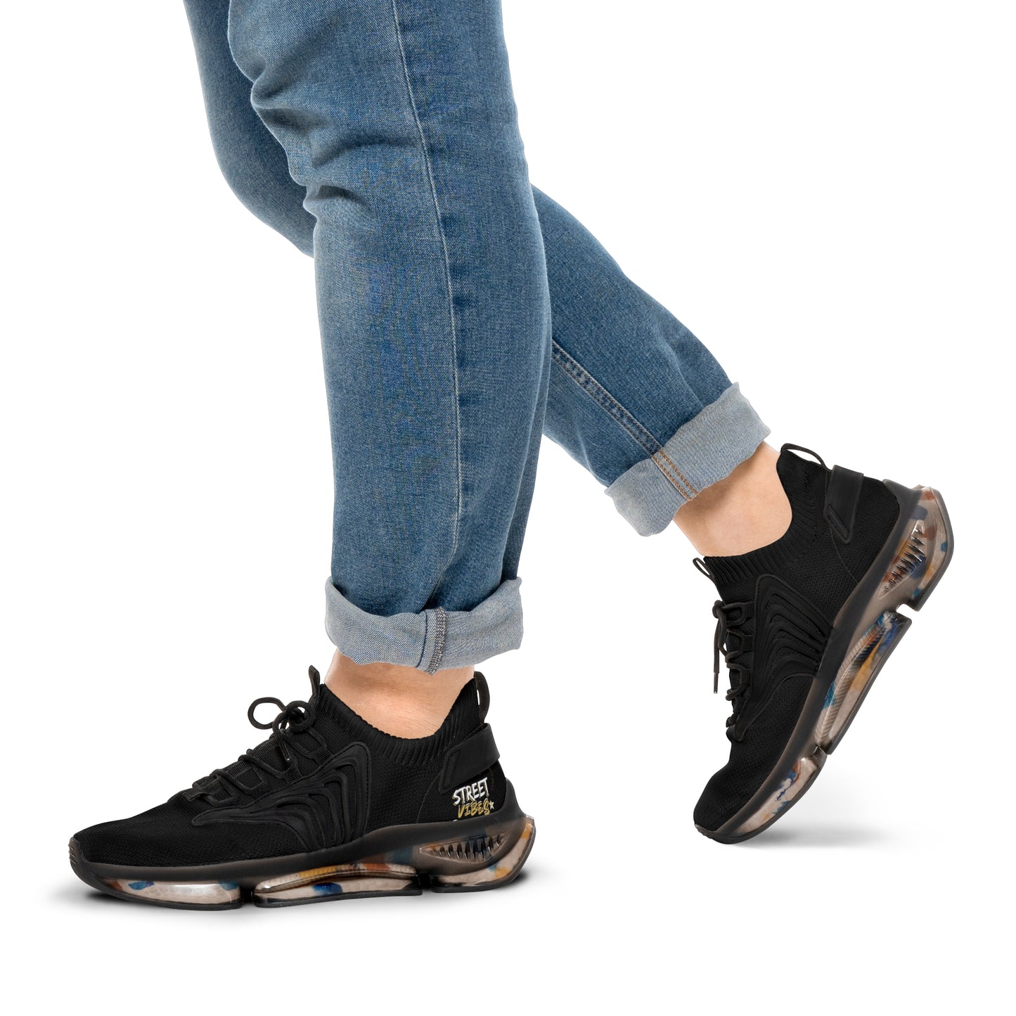 Essence Innovation 'Street Vibes' athletic shoes worn with blue jeans on a white background