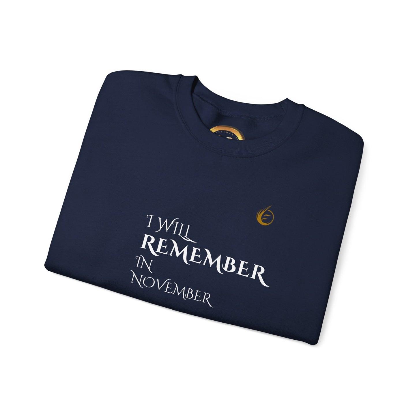 Folded black EssenceInnoCreate Quiet Resolve sweatshirt with 'I will remember in November' text on a white background