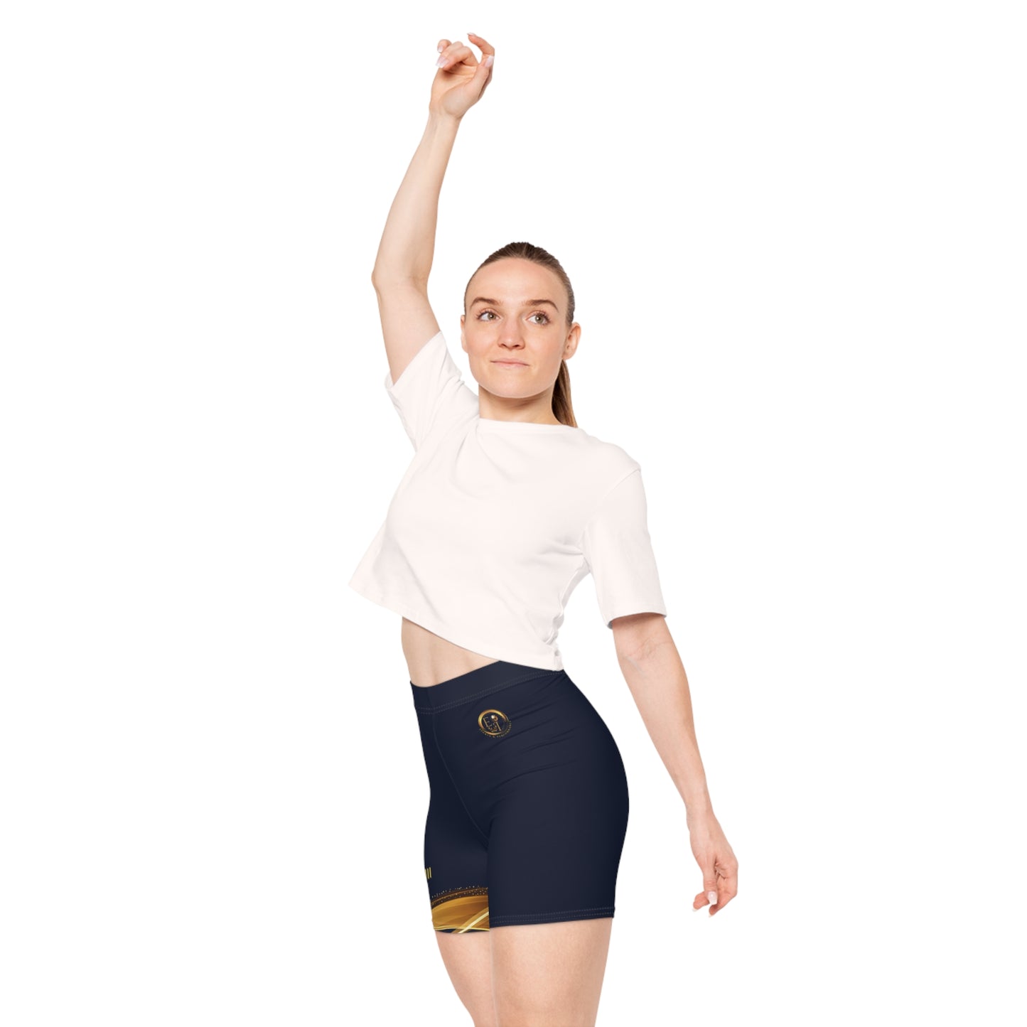 Woman wearing navy shorts with gold accents on a white background