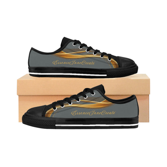Black and gray 'EssenceInnoCreate' sneakers with gold accents on a white background