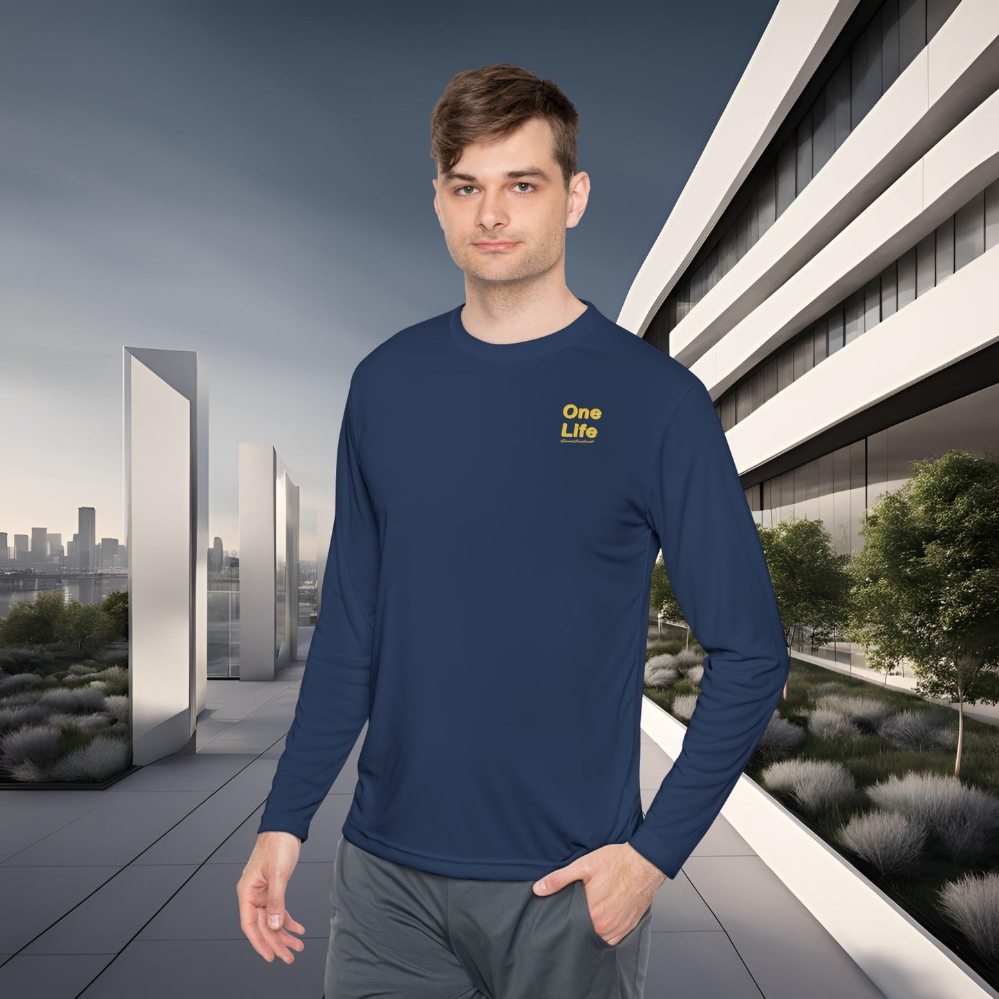 Man wearing a navy blue long-sleeve shirt with 'One Life' text in yellow, standing in an urban setting.