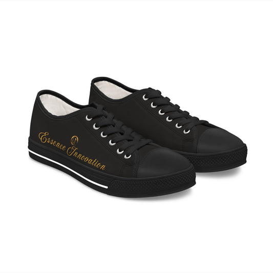 Black Essence Innovation sneakers with white laces on a white background