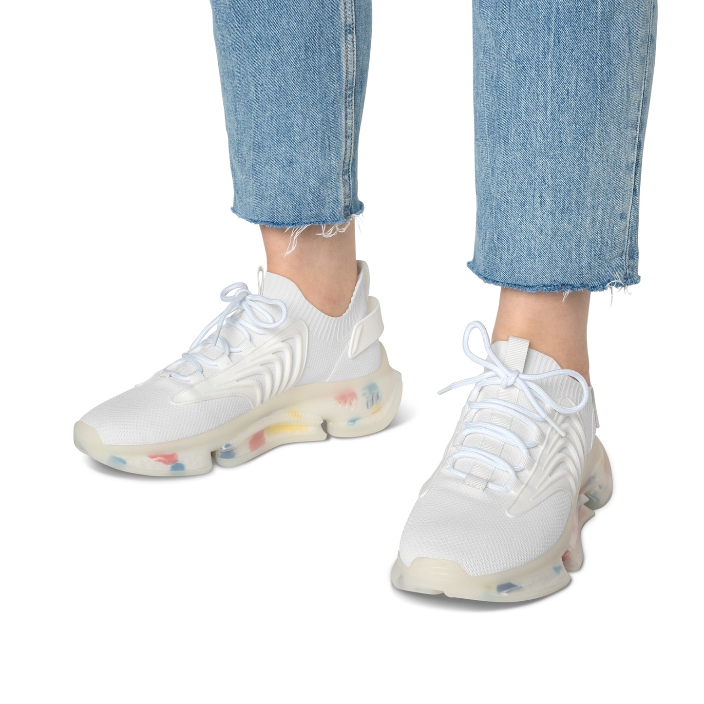 White Essence Innovation 'Street Vibes' sneakers with colorful sole worn with light blue jeans on a white background