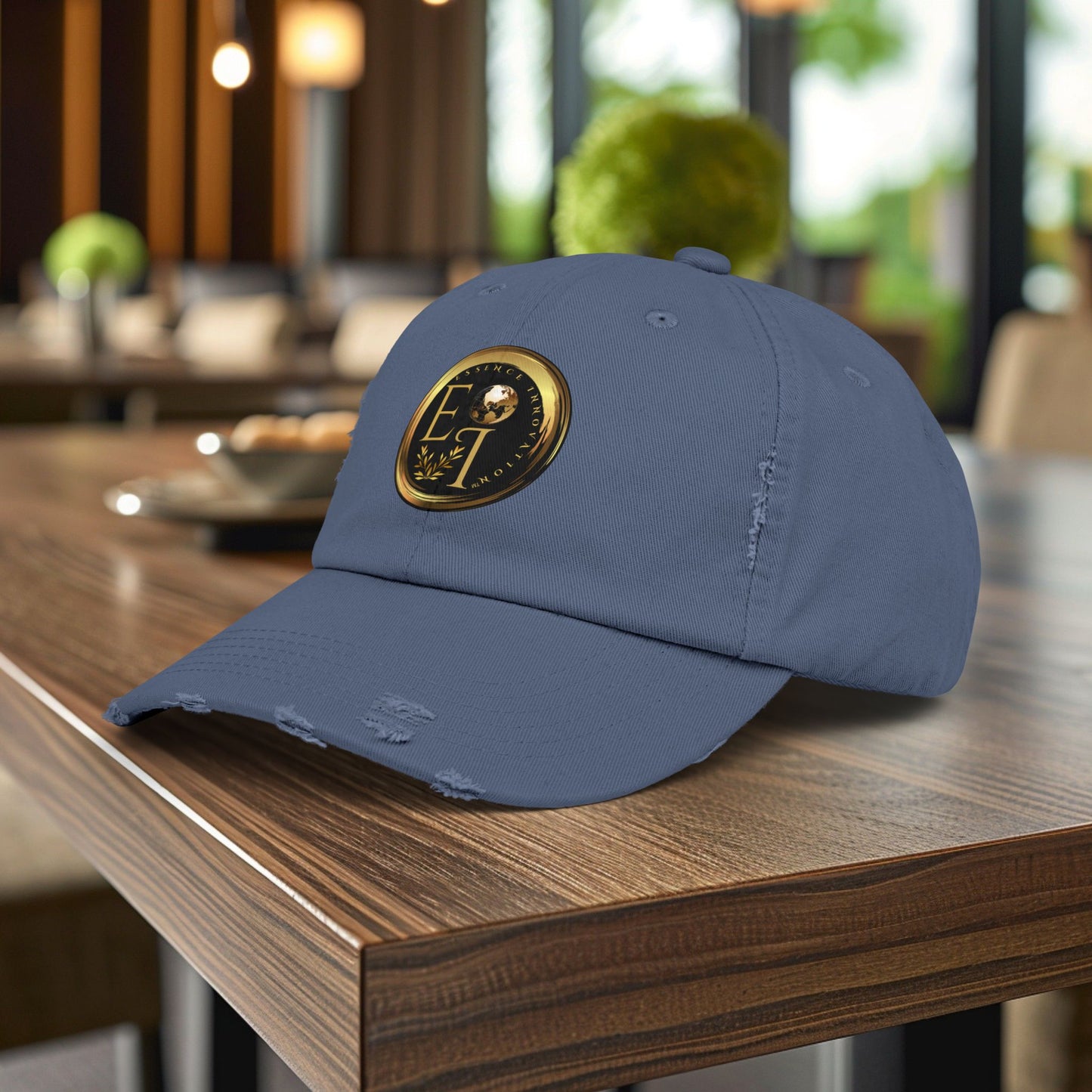 Blue Essence Innovation cap with a logo on a wooden table in an indoor setting
