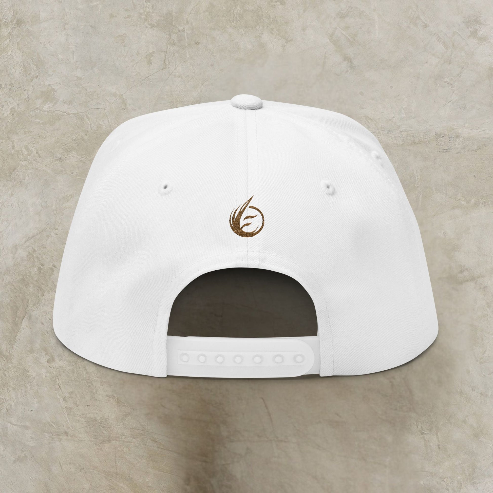 White cap with a brown EssenceInnoCreate logo on a beige background