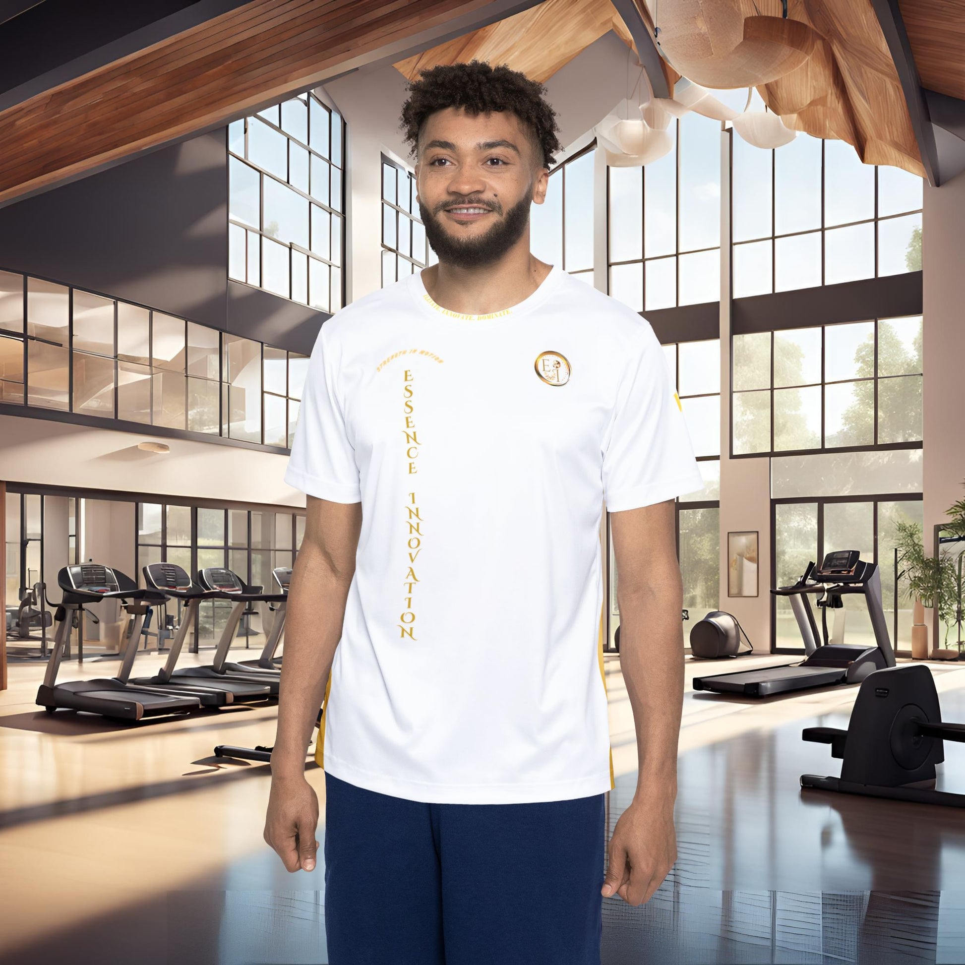 Man wearing a white t-shirt with Essence Innovation logo and text in a modern gym setting