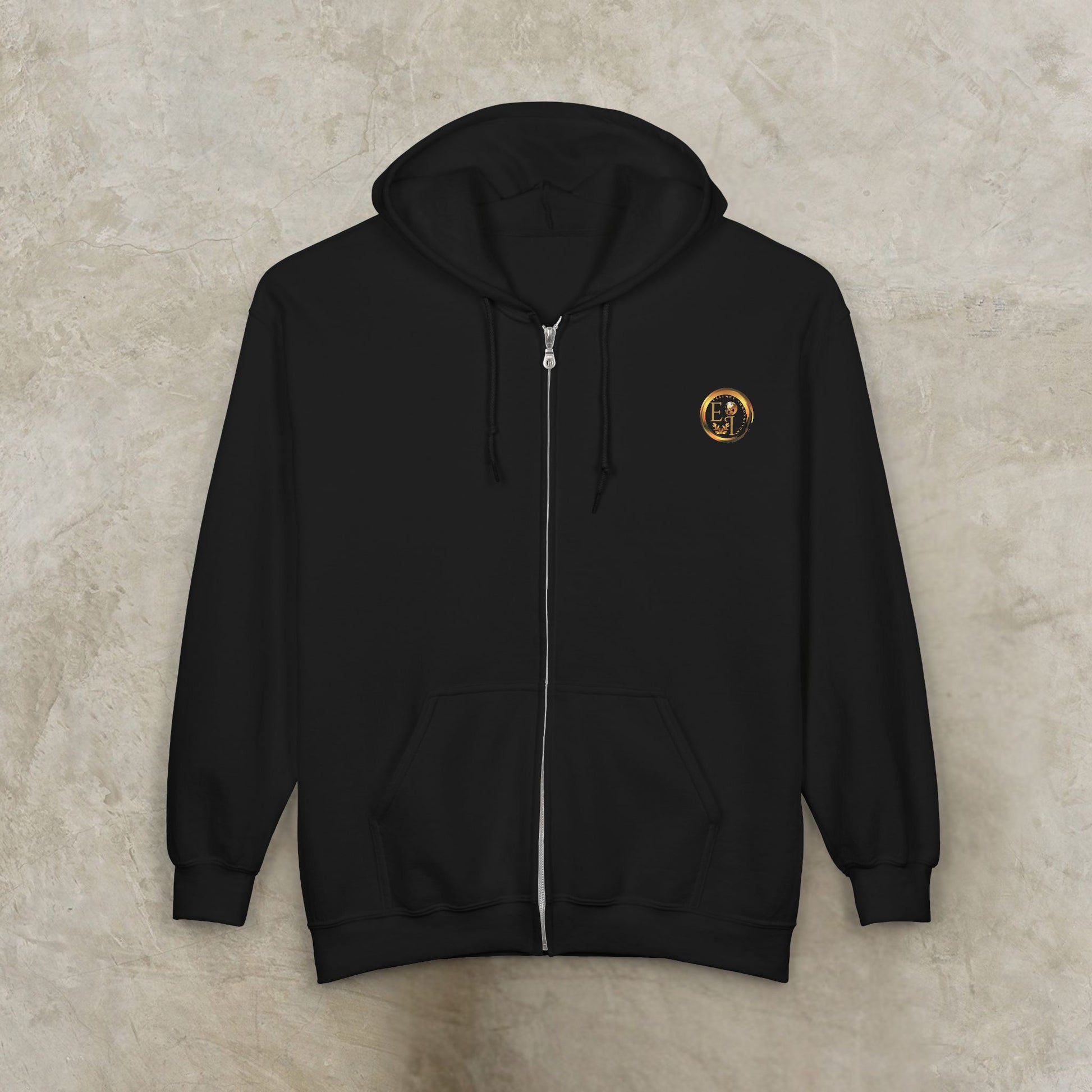 Black Essence Innovation 'One Life' hoodie with a gold logo on a beige background
