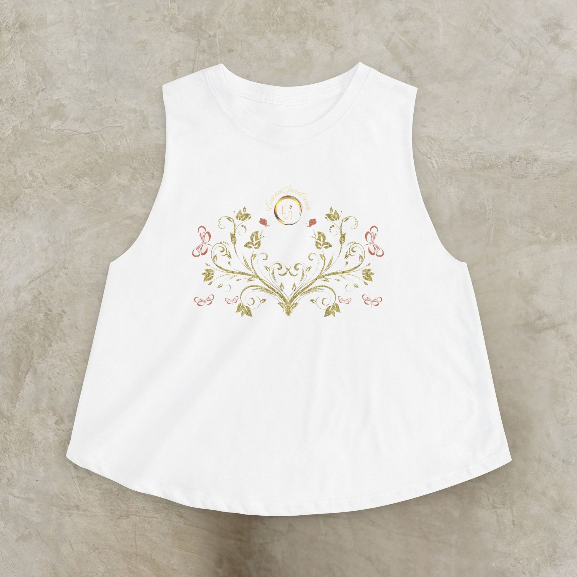 White sleeveless top with Essence Innovation Bohemian Butterfly floral embroidery on a beige background
