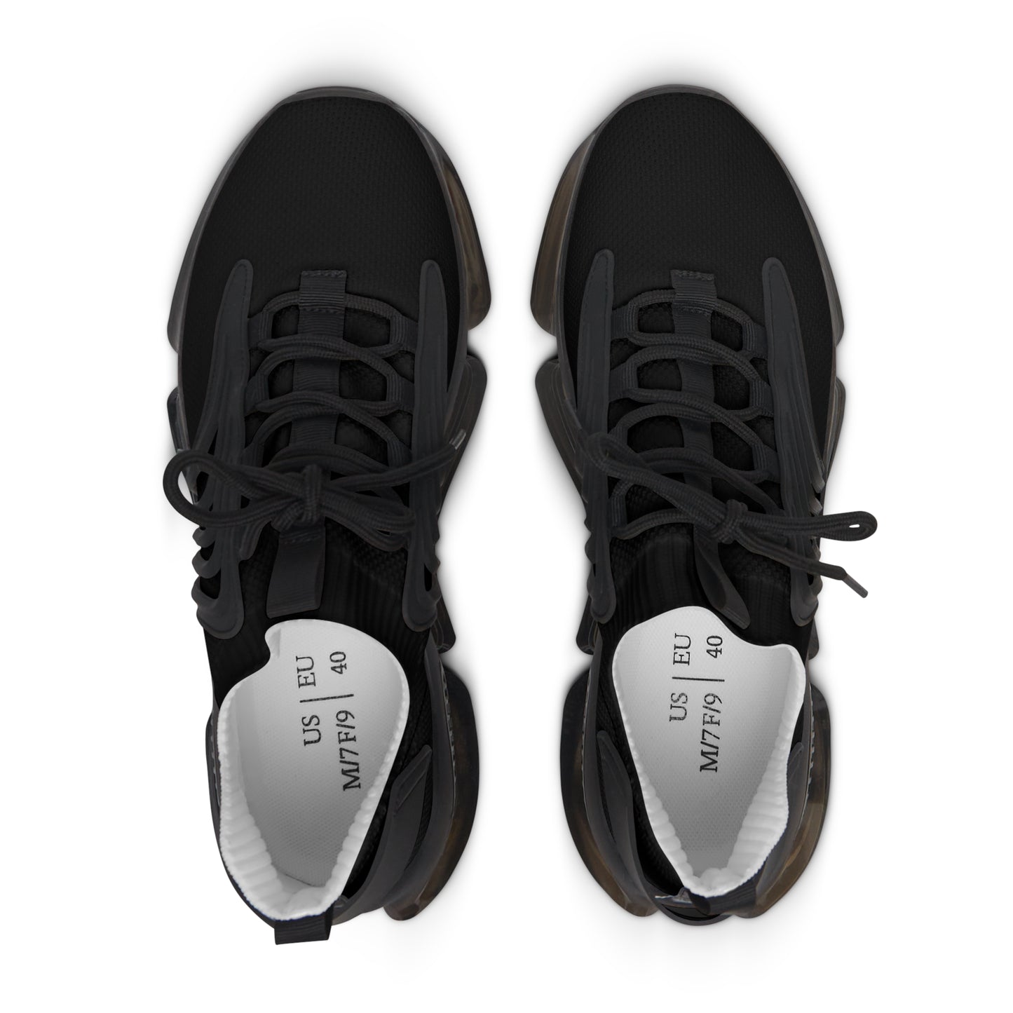 Black sneakers with visible Essence Innovation 'Street Vibes' brand name on a white background