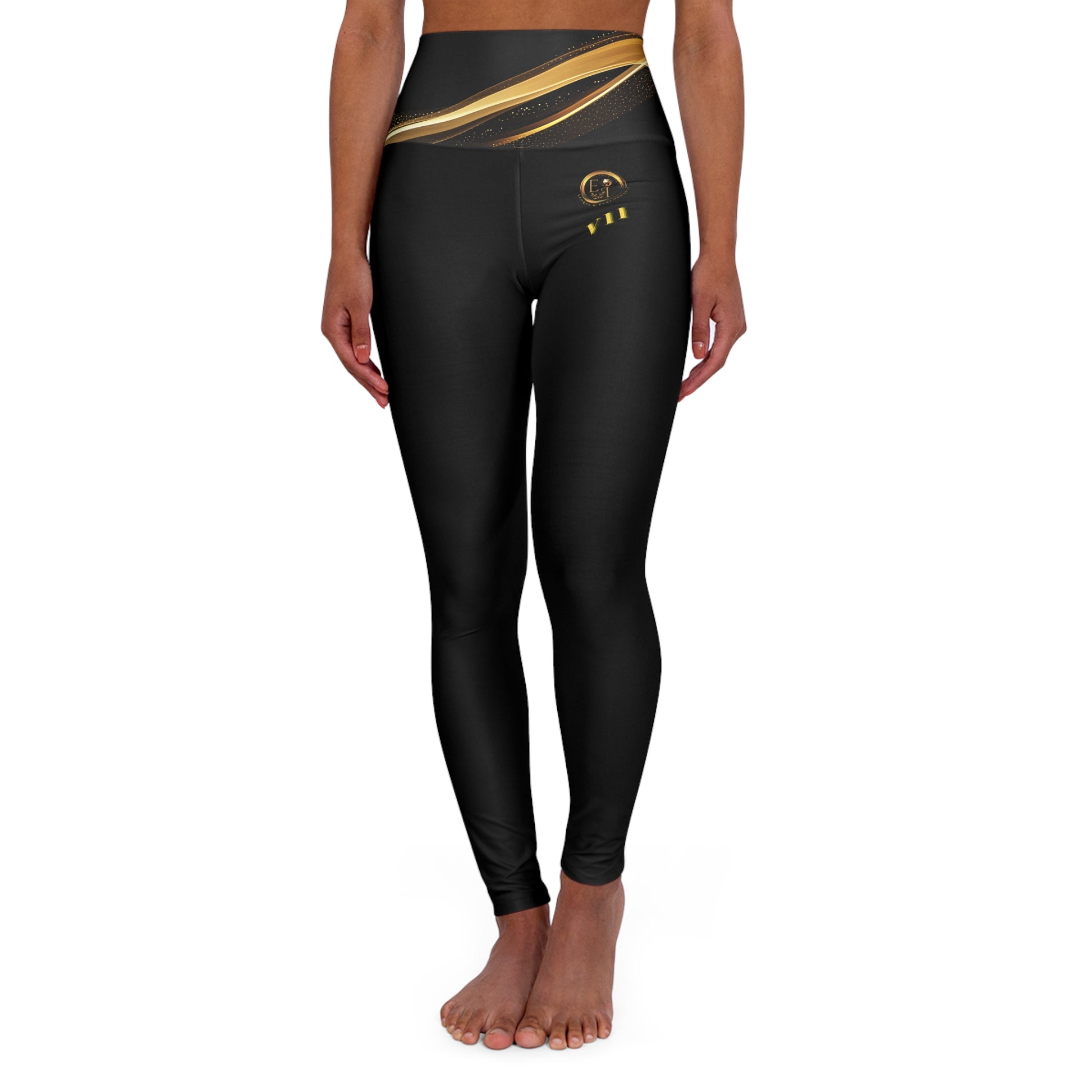 Black leggings with gold accents on a white background