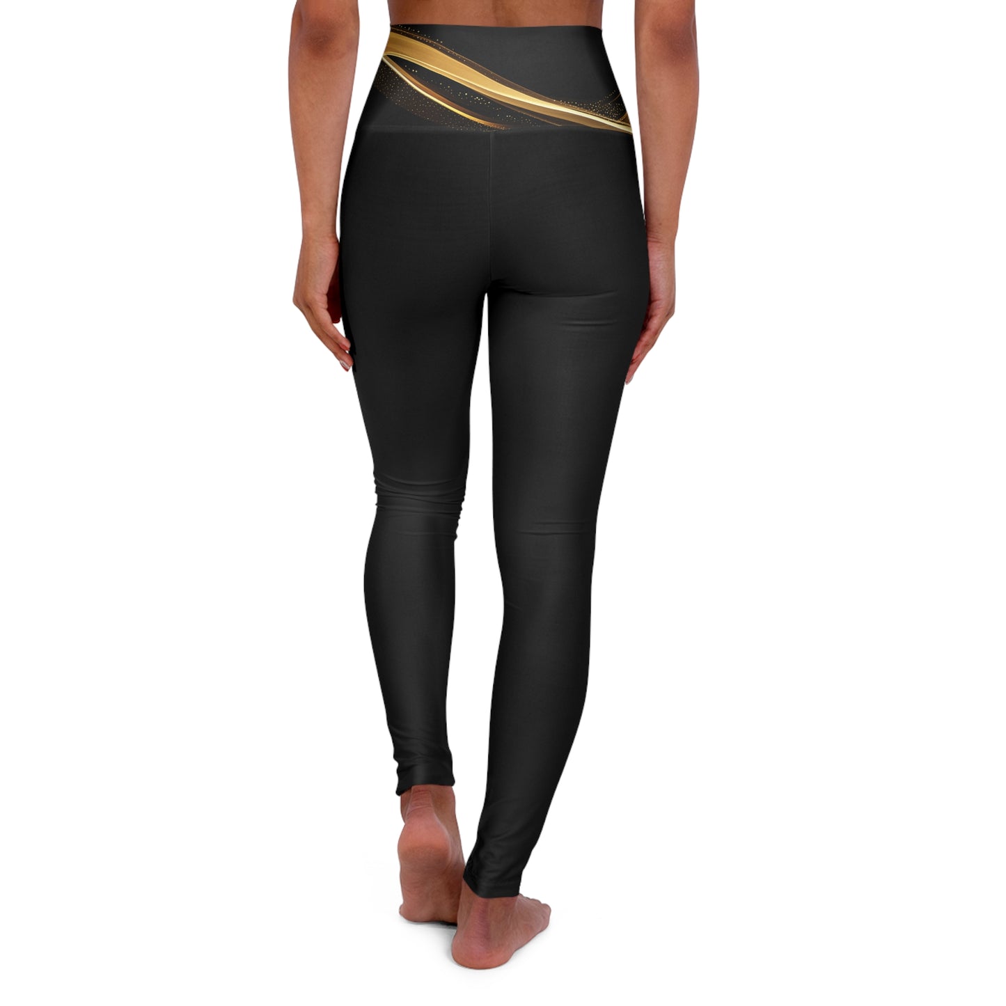 Black leggings with gold accents on a white background