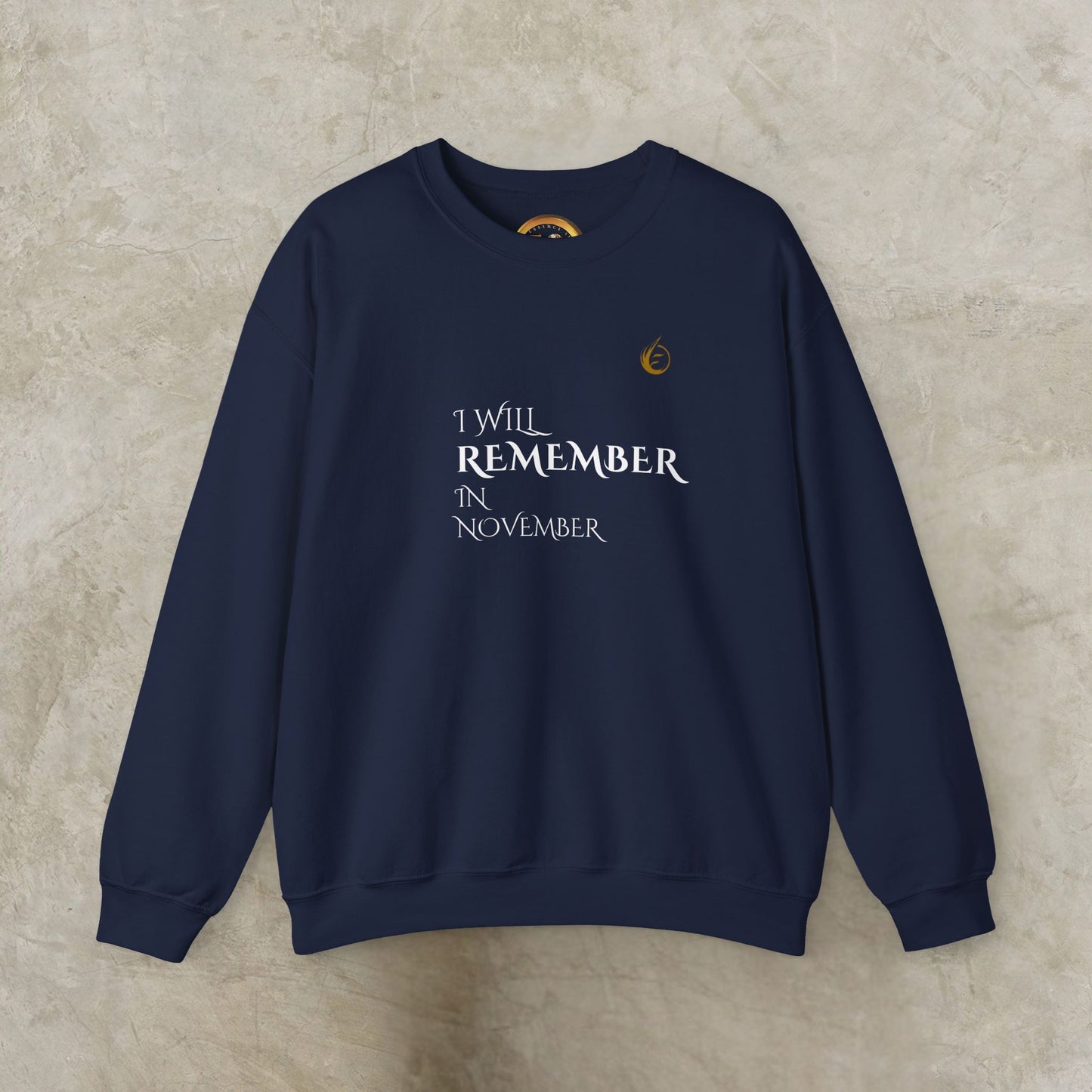 Navy blue EssenceInnoCreate Quiet Resolve sweatshirt with text on a beige background