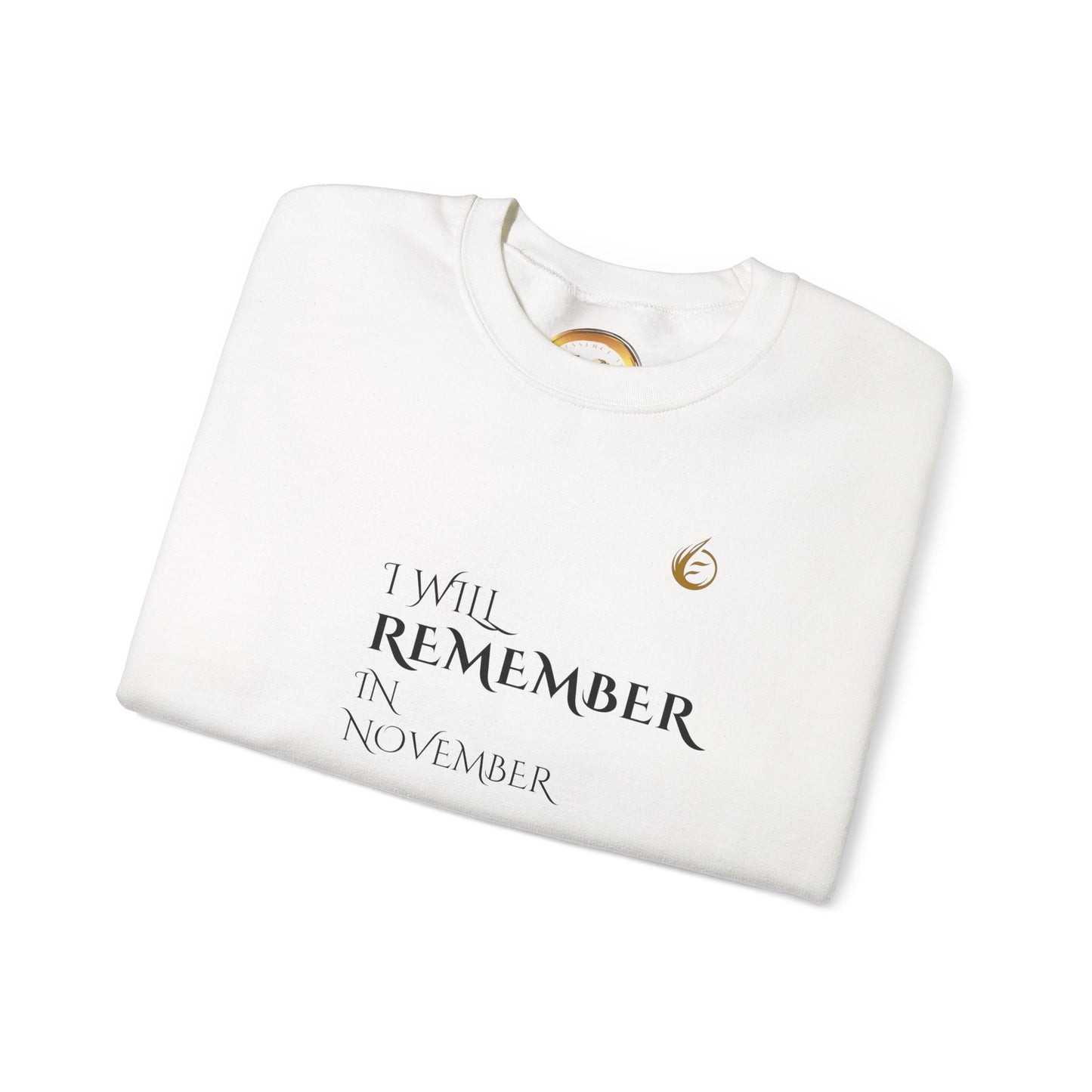 White EssenceInnoCreate Quiet Resolve sweatshirt with text 'I Will Remember In November' on a white background