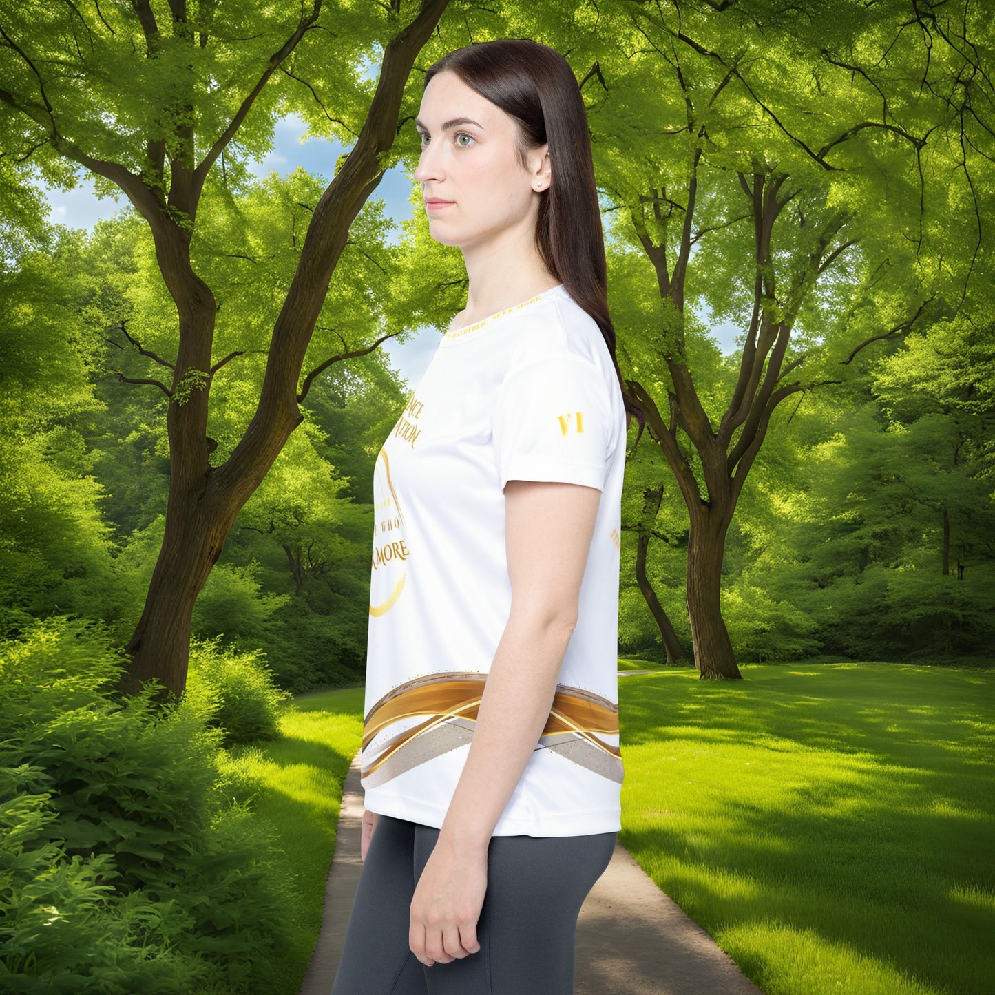 Woman wearing a white t-shirt with a logo in a park setting