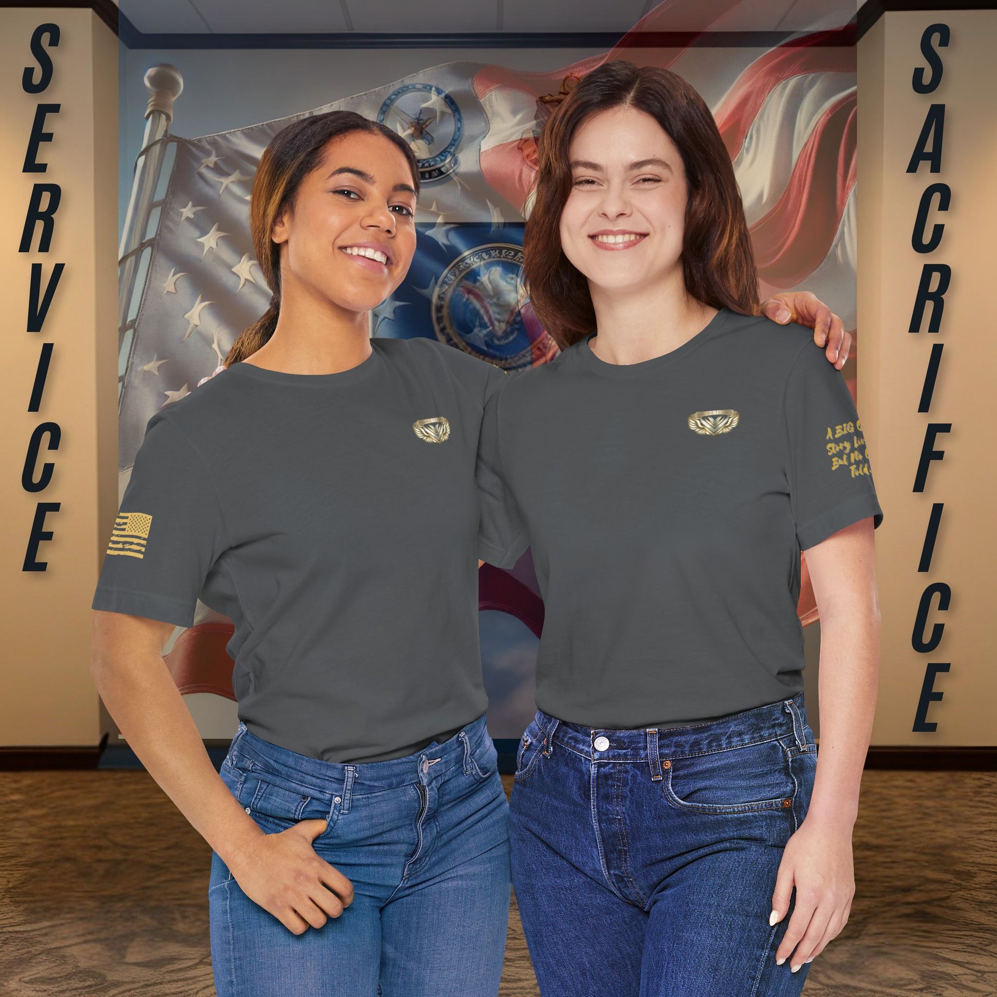 Two women wearing matching gray t-shirts with a logo, standing in front of a mural with 'Service' and 'Sacrifice' text.