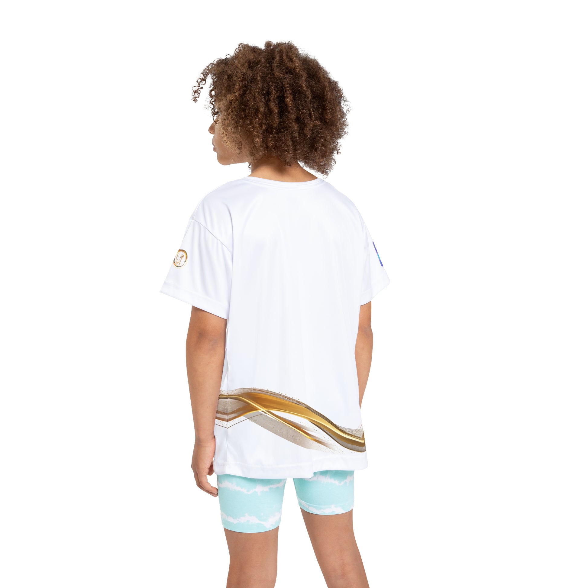 Person wearing a white t-shirt with gold design and light blue shorts on a white background