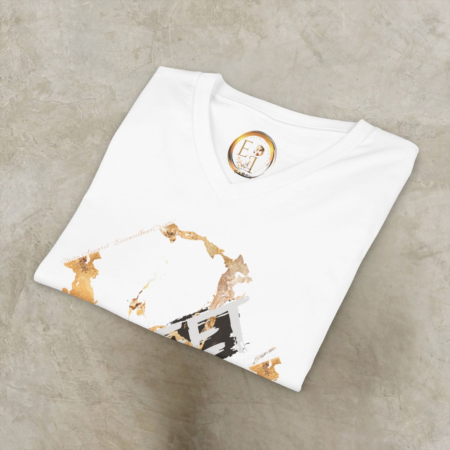 White EssenceInnoCreate t-shirt with artistic design and logo on a gray surface