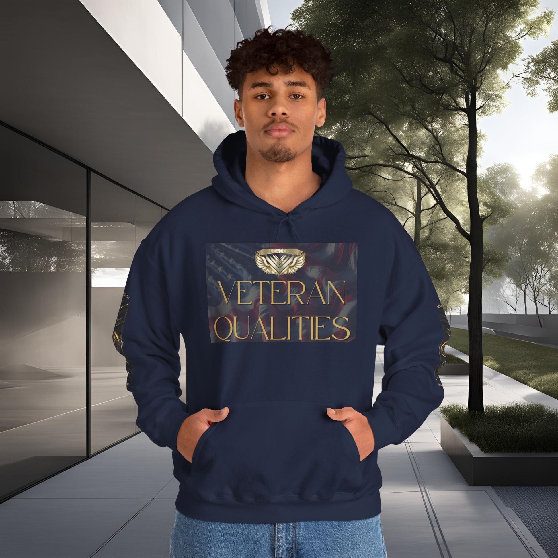 Person wearing a navy Essence Innovation hoodie with 'Veteran Qualities' text in an outdoor setting
