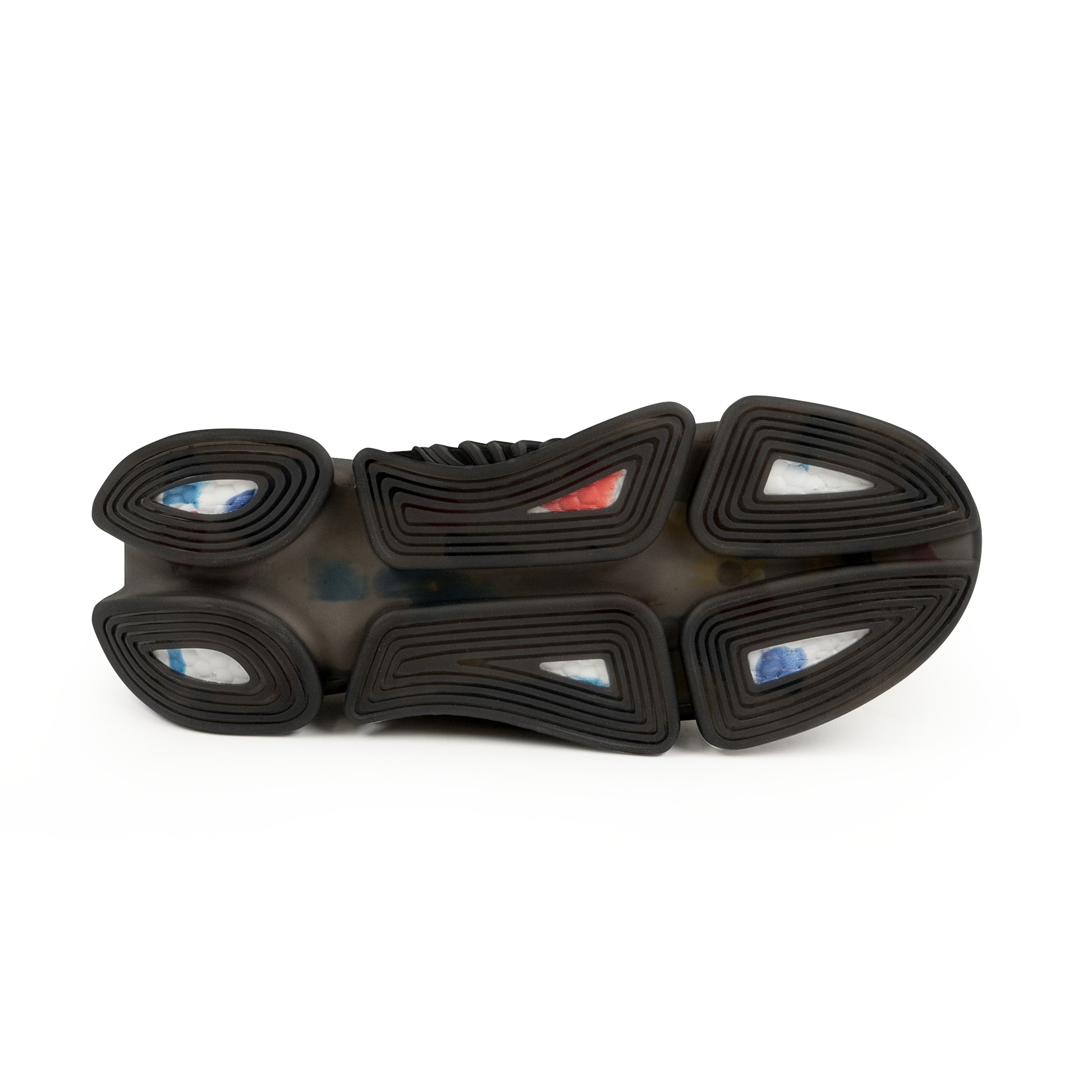 Close-up of an 'EssenceInnoCreate' shoe sole with black rubber and multicolored accents on a white background