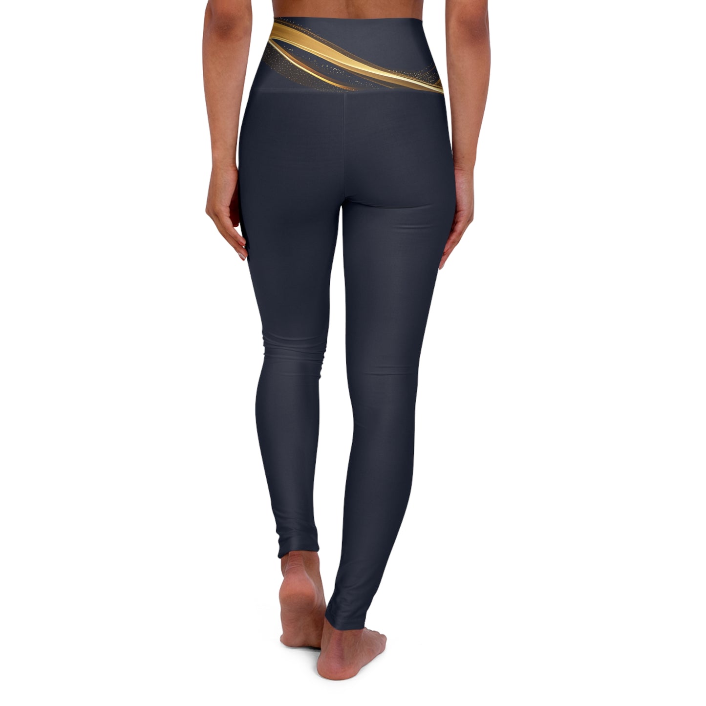Black leggings with gold accent on a white background
