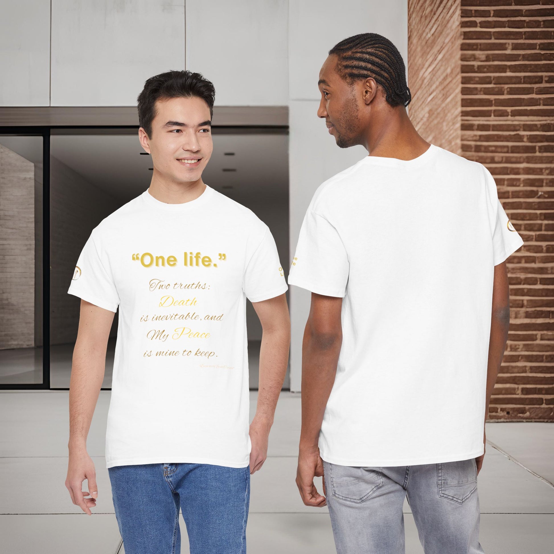Two people wearing white t-shirts with One Life text, one indoors and one outdoors.