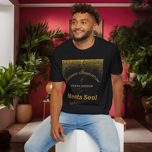 Man wearing a black t-shirt with gold Essence Innovation 'Design Meets Soul' text in a room with plants and a red wall.