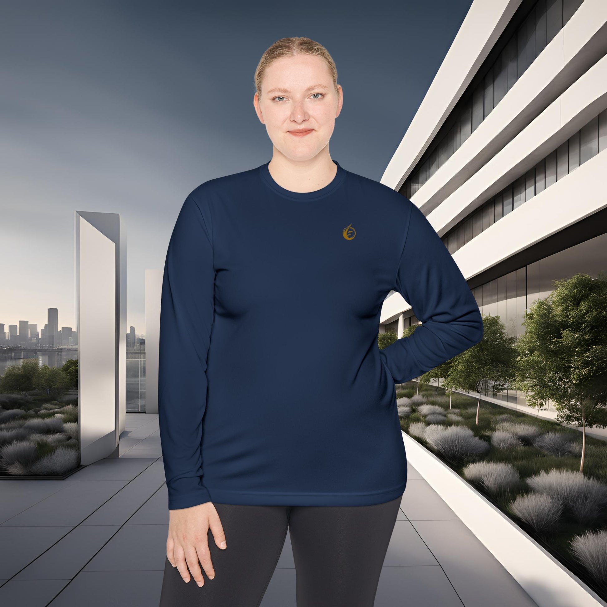 Person wearing a navy blue long-sleeve shirt with 'EssenceInnoCreate' logo in an urban setting