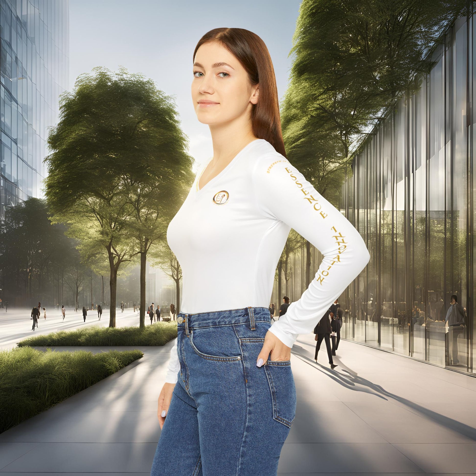 Woman in an Essence Innovation Seek More, white long-sleeve shirt and blue jeans standing in an urban setting with modern buildings and trees.