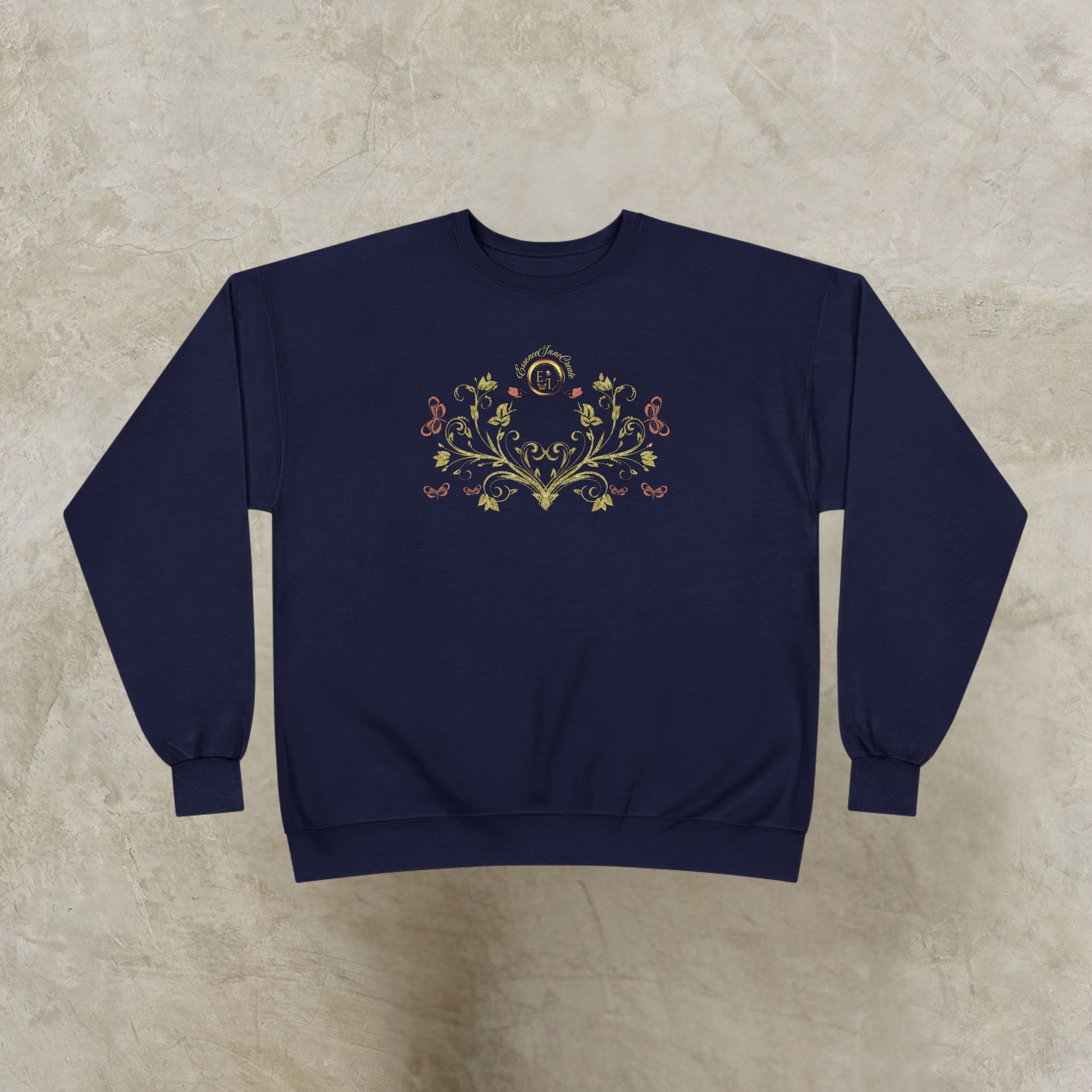 Navy blue sweatshirt with floral Essence Innovation Bohemian Butterfly Crest design on a beige background