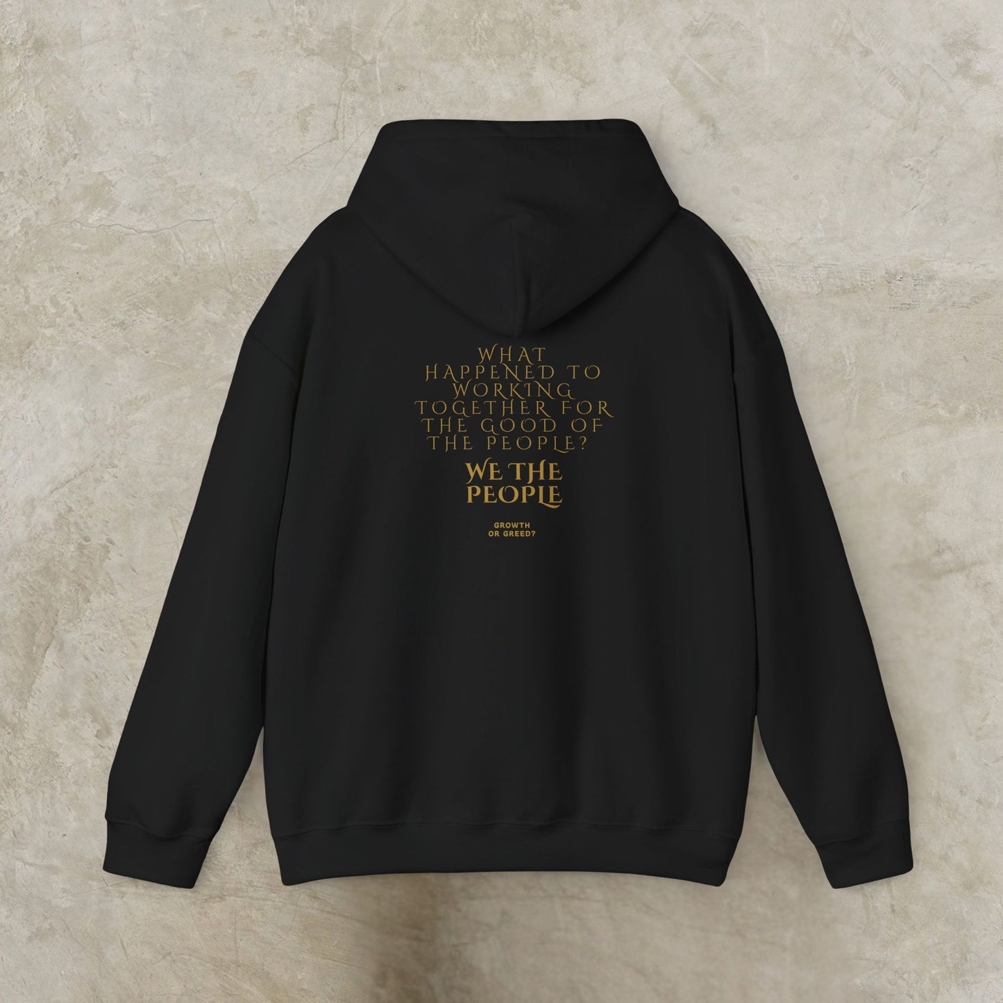 Black EssenceInnoCreate Quiet Resolve hoodie with gold text on a beige background
