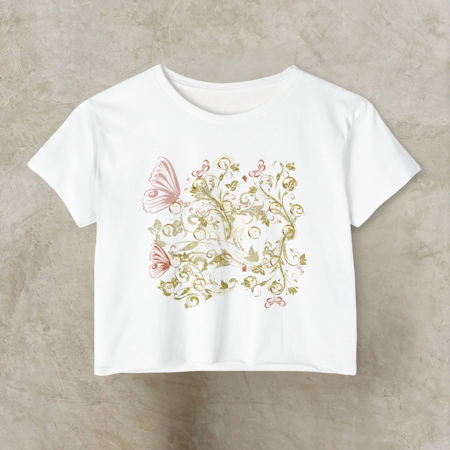 White t-shirt with floral and Essence Innovation Bohemian Butterfly design on a beige background