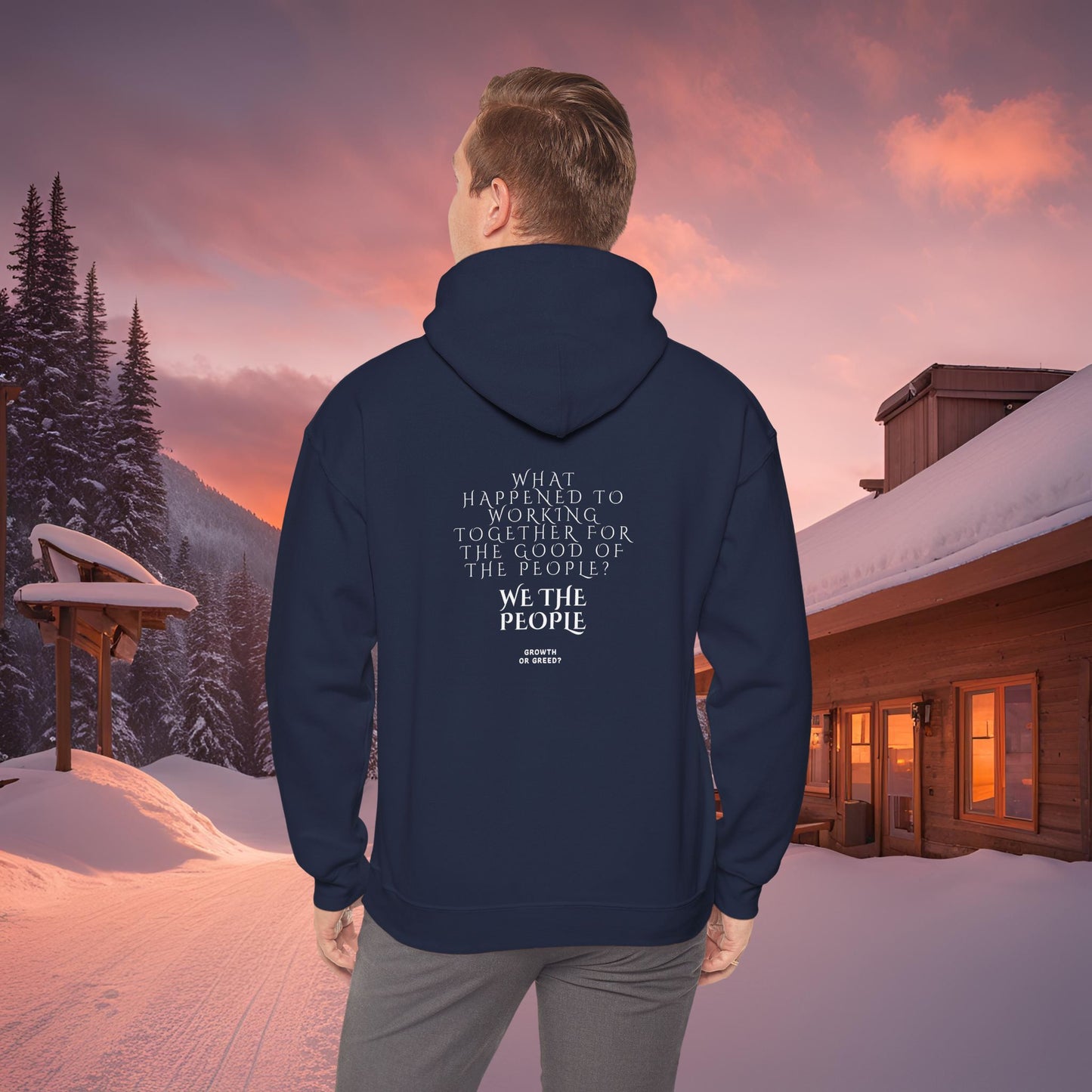 Person wearing a EssenceInnoCreate Quiet Resolve hoodie with text in a snowy landscape with a cabin.