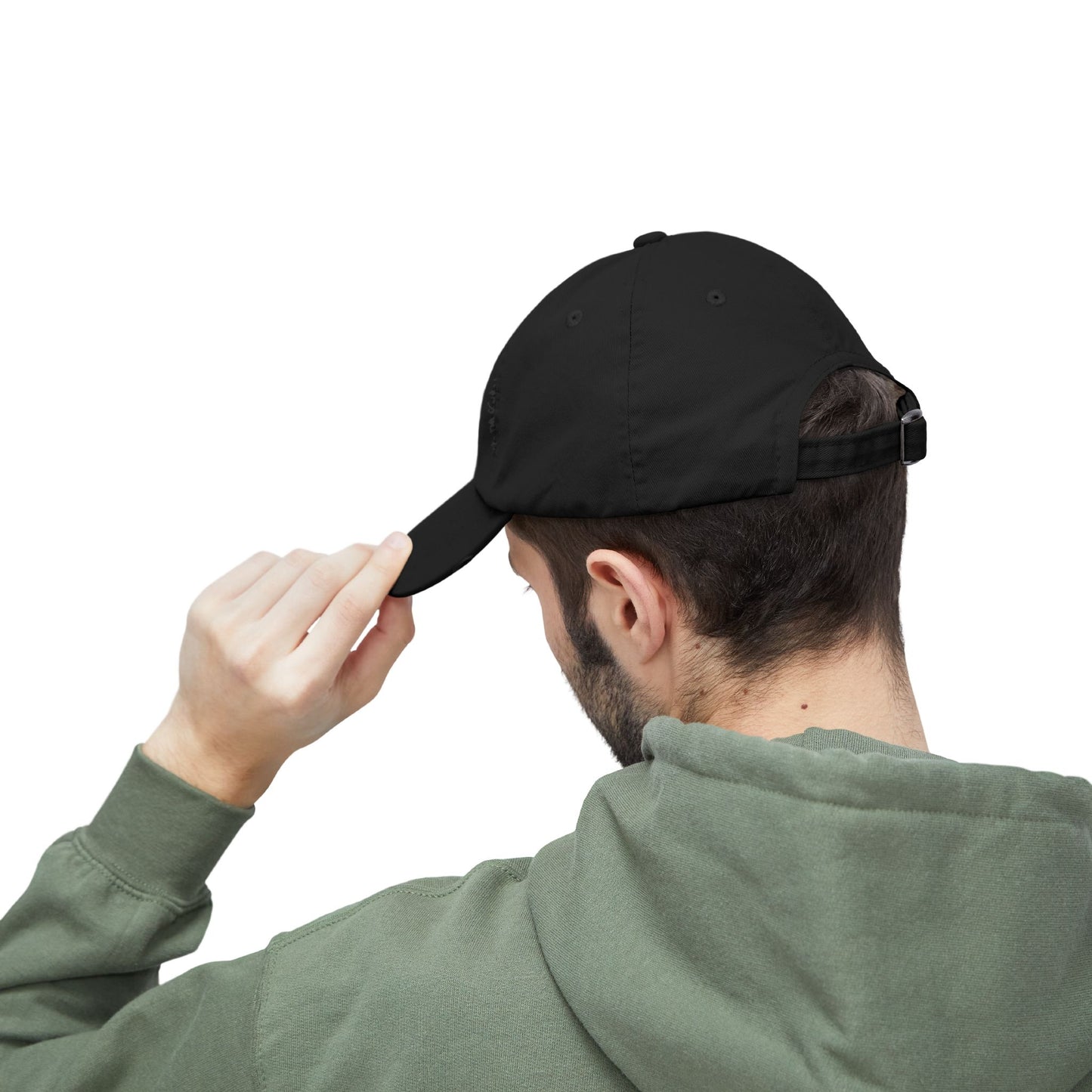 Person wearing a black Essence Innovation cap and green hoodie on a white background