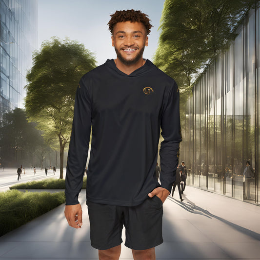Man wearing a black Essence Innovation Seek More long-sleeve hoodie with a logo in an urban setting