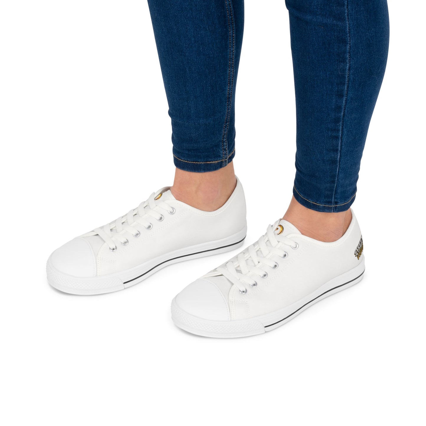 White Essence Innovation 'Street Vibes' sneakers worn with blue jeans on a white background