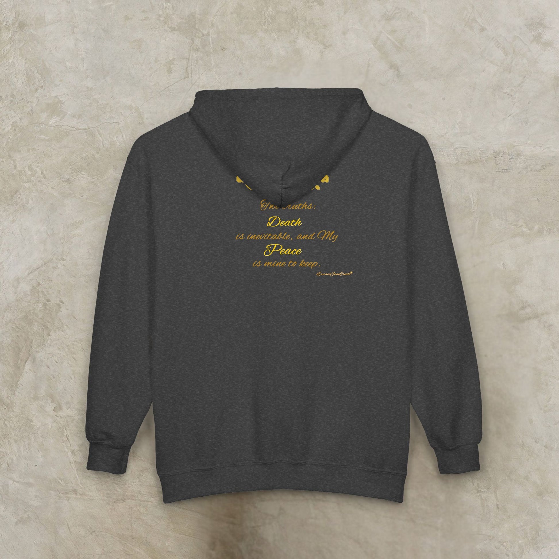 Dark gray Essence Innovation 'One Life' hoodie with yellow text on a textured beige background