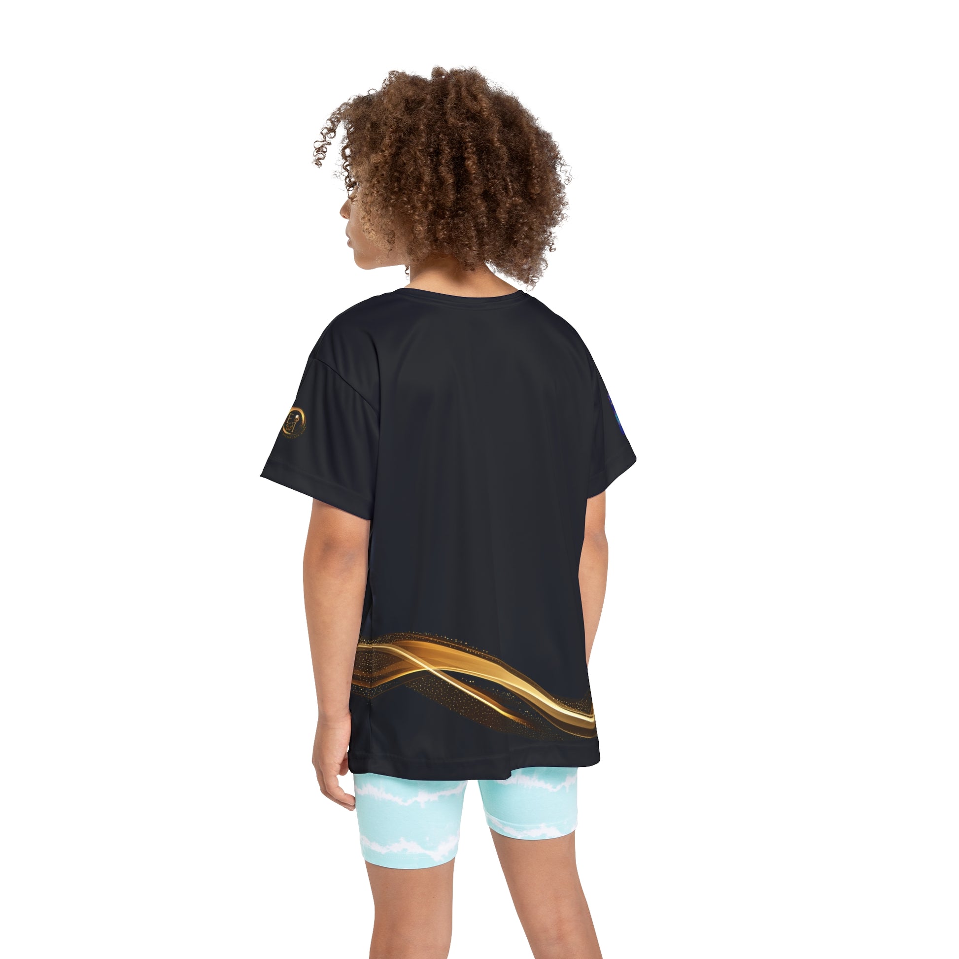 Person wearing a black Essence Innovation t-shirt with gold design and light blue shorts on a white background