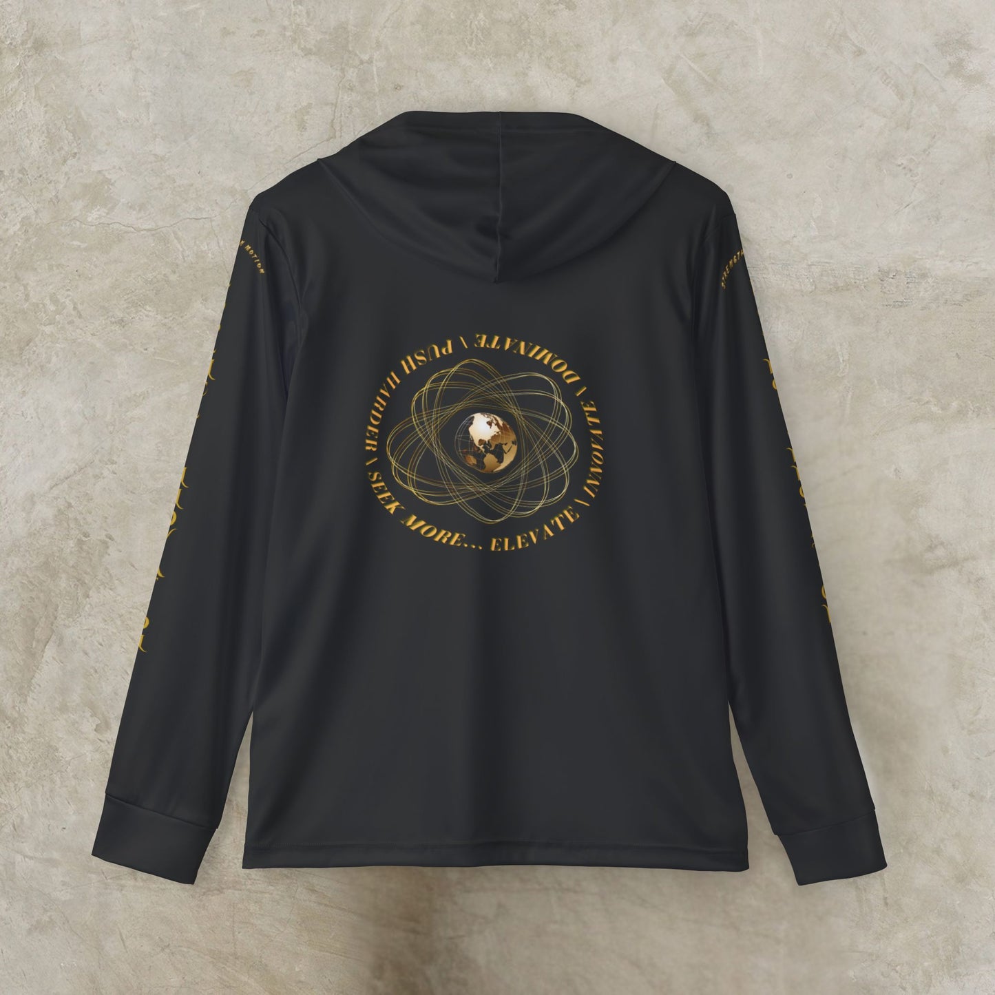 Black Essence Innovation Seek More hoodie with gold design on the back against a beige background