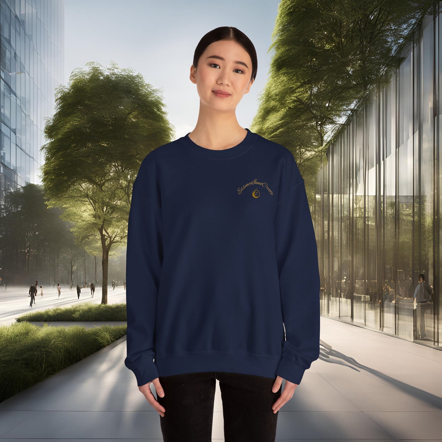 Person wearing a navy blue sweatshirt with 'EssenceInnoCreate' logo in an urban setting