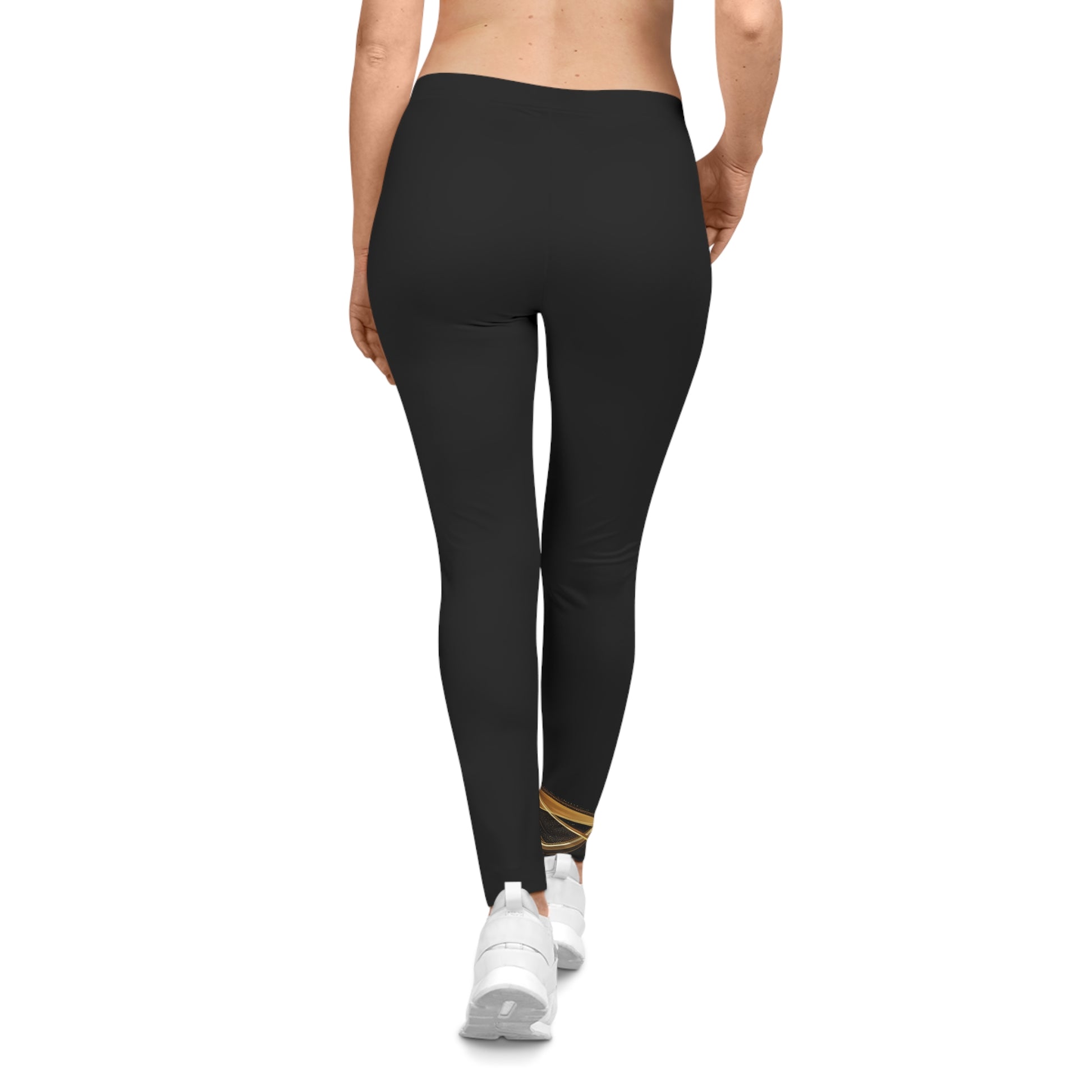 Person wearing black leggings on a white background
