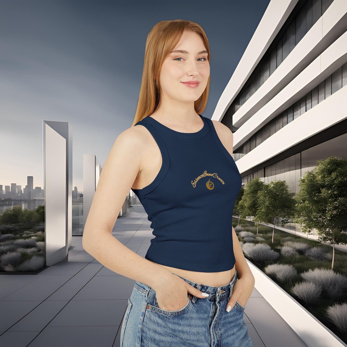 Woman wearing a navy blue tank top with a EssenceInnoCreate logo in an urban setting