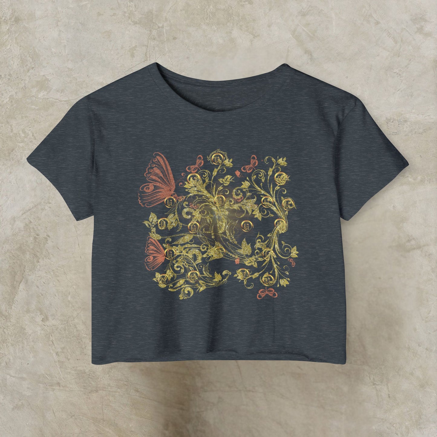 Dark gray t-shirt with Essence Innovation Bohemian Butterfly and floral design on a beige background