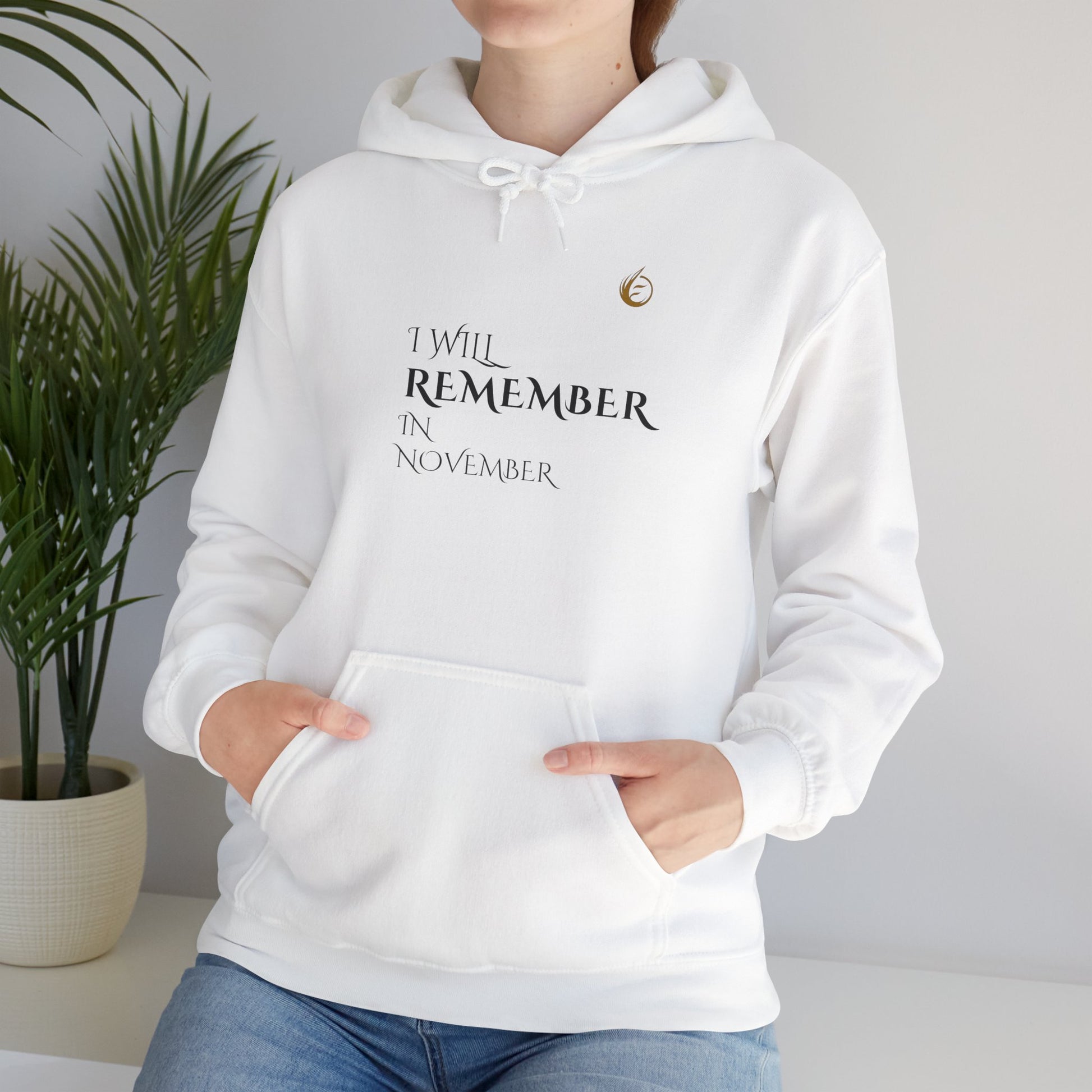 white EssenceInnoCreate Quiet Resolve hoodie.