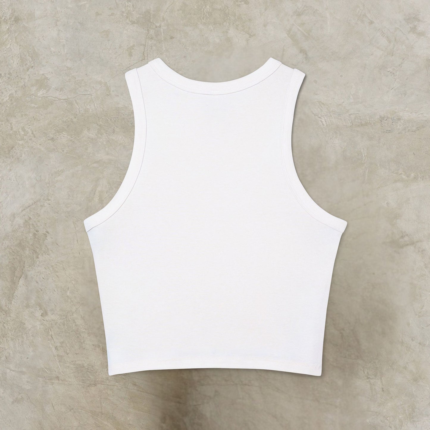 White tank top on a beige concrete background