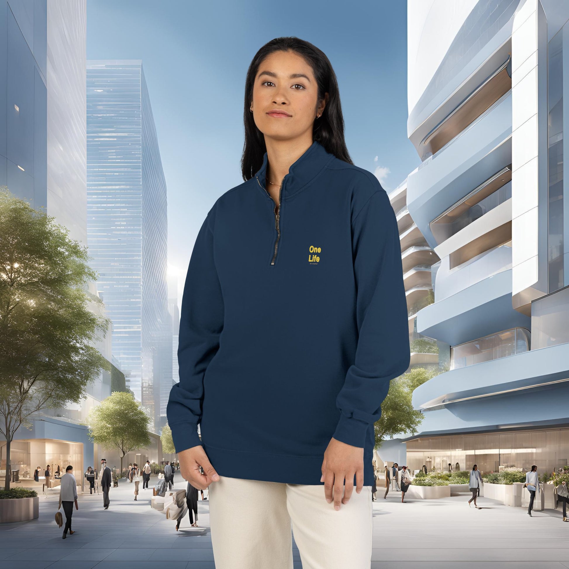 Person wearing a navy blue sweatshirt with 'One Life' logo in an urban setting