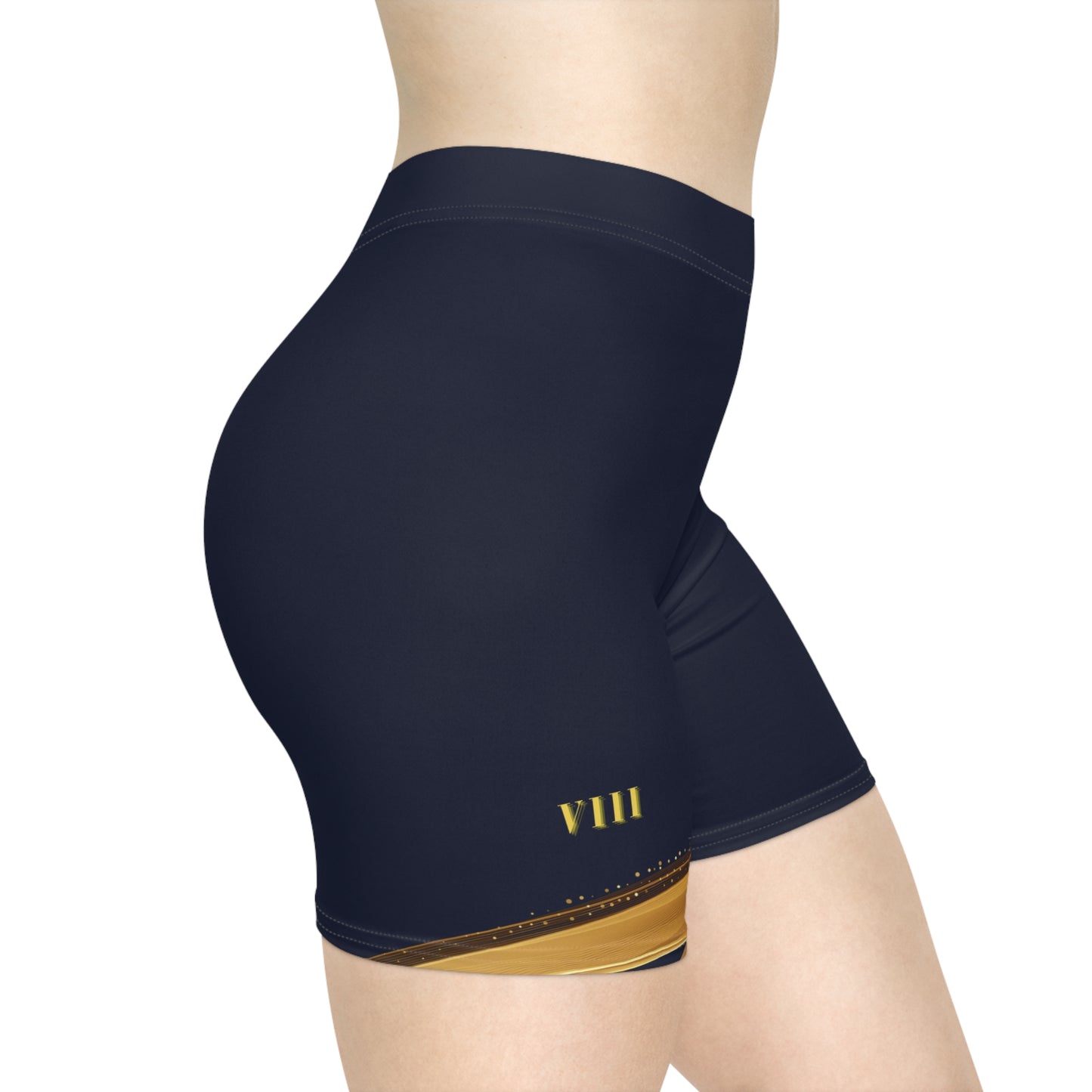 Navy athletic shorts with gold accents on a white background