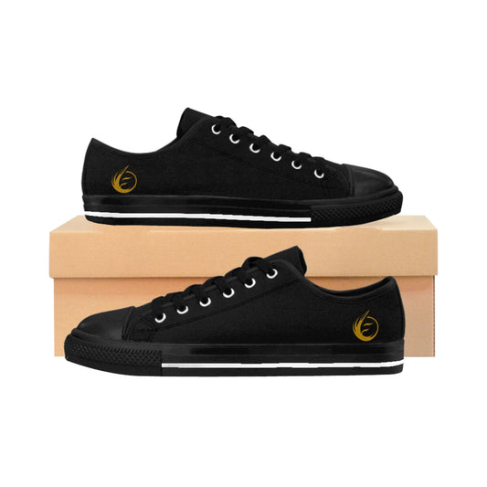 Black EssenceInnoCreate sneakers with white patterns on a wooden box against a white background