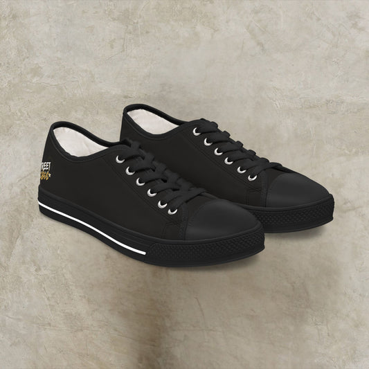 Black sneakers with 'Street Vibes' on a beige background