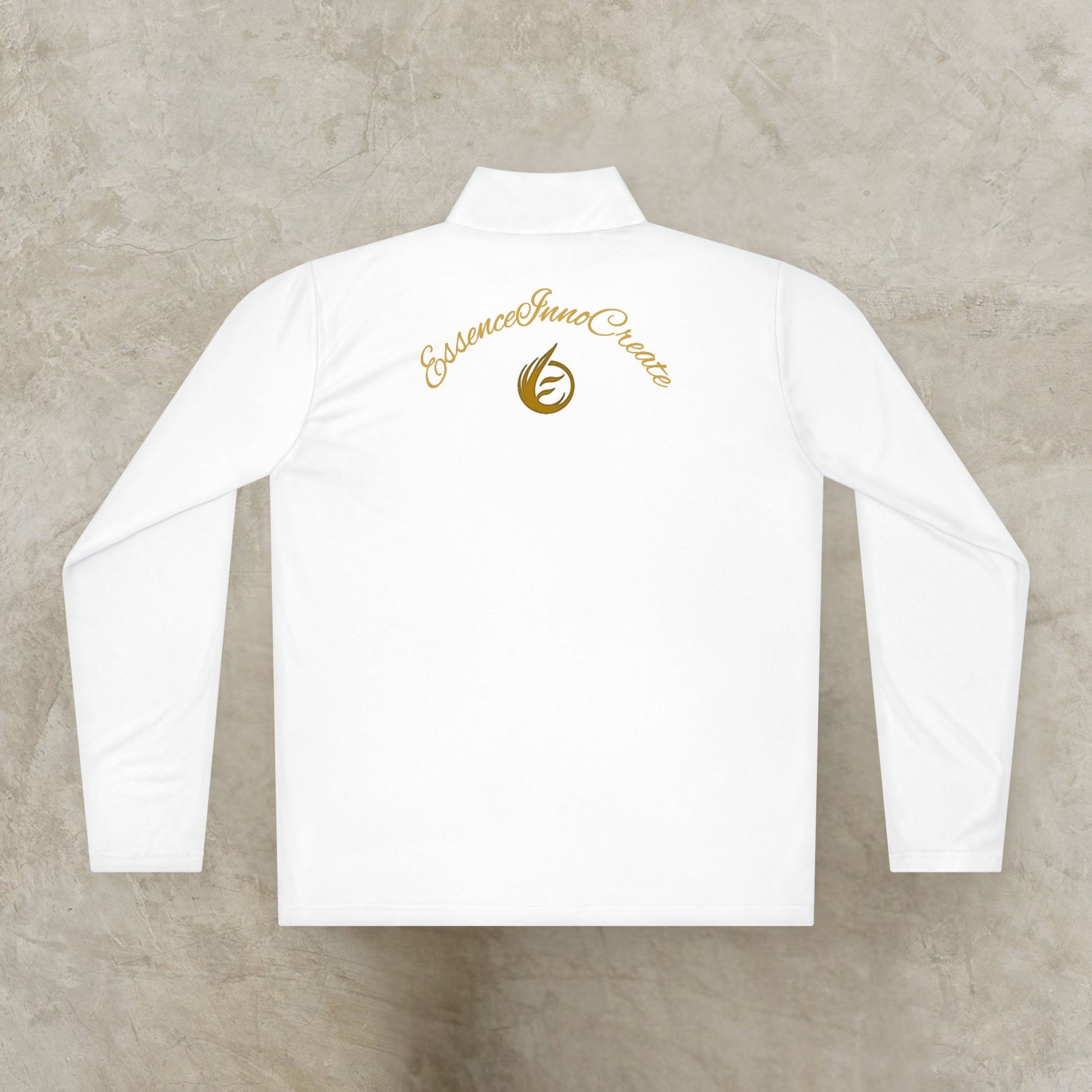 White long-sleeve shirt with gold 'EssenceInnoCreate' logo on a beige background