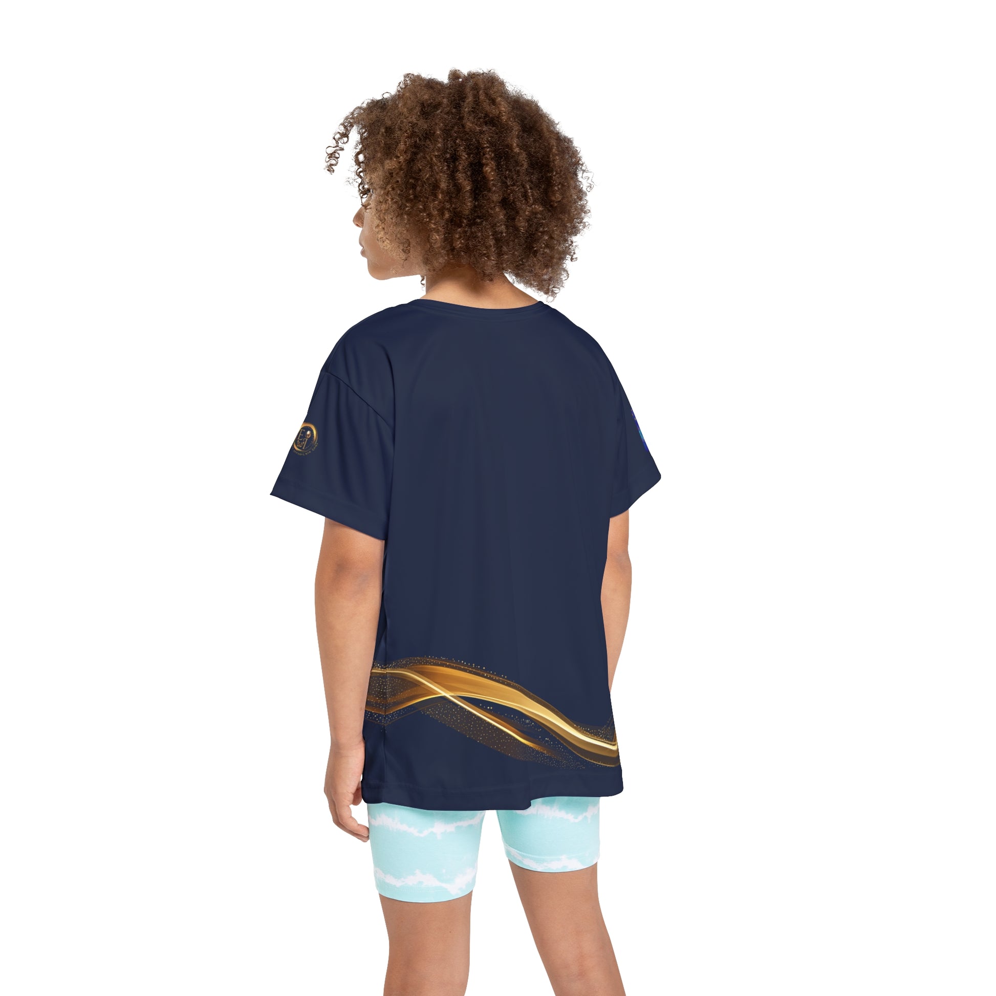 Person wearing a navy blue t-shirt with a gold design on the back, standing against a white background.